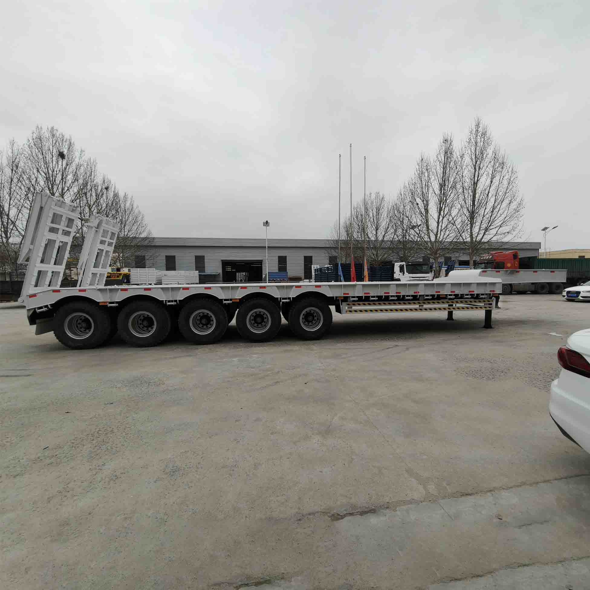 Төмен төсеніш тіркеме ауыр жүкті тасымалдаудың тиімділігін қалай арттырады?